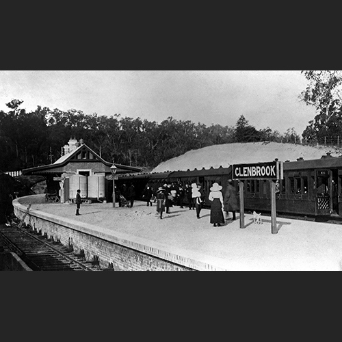 A century old photograph of Glenbrook Railway Station, a wooden passenger train at platform with many well-dressed passengers embarking and disembarking. A century old photograph of Glenbrook Railway Station, a wooden passenger train at platform with many well-dressed passengers embarking and disembarking.